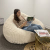 Ivoria – Pouf XXL beige en velours côtelé (grosse côte)